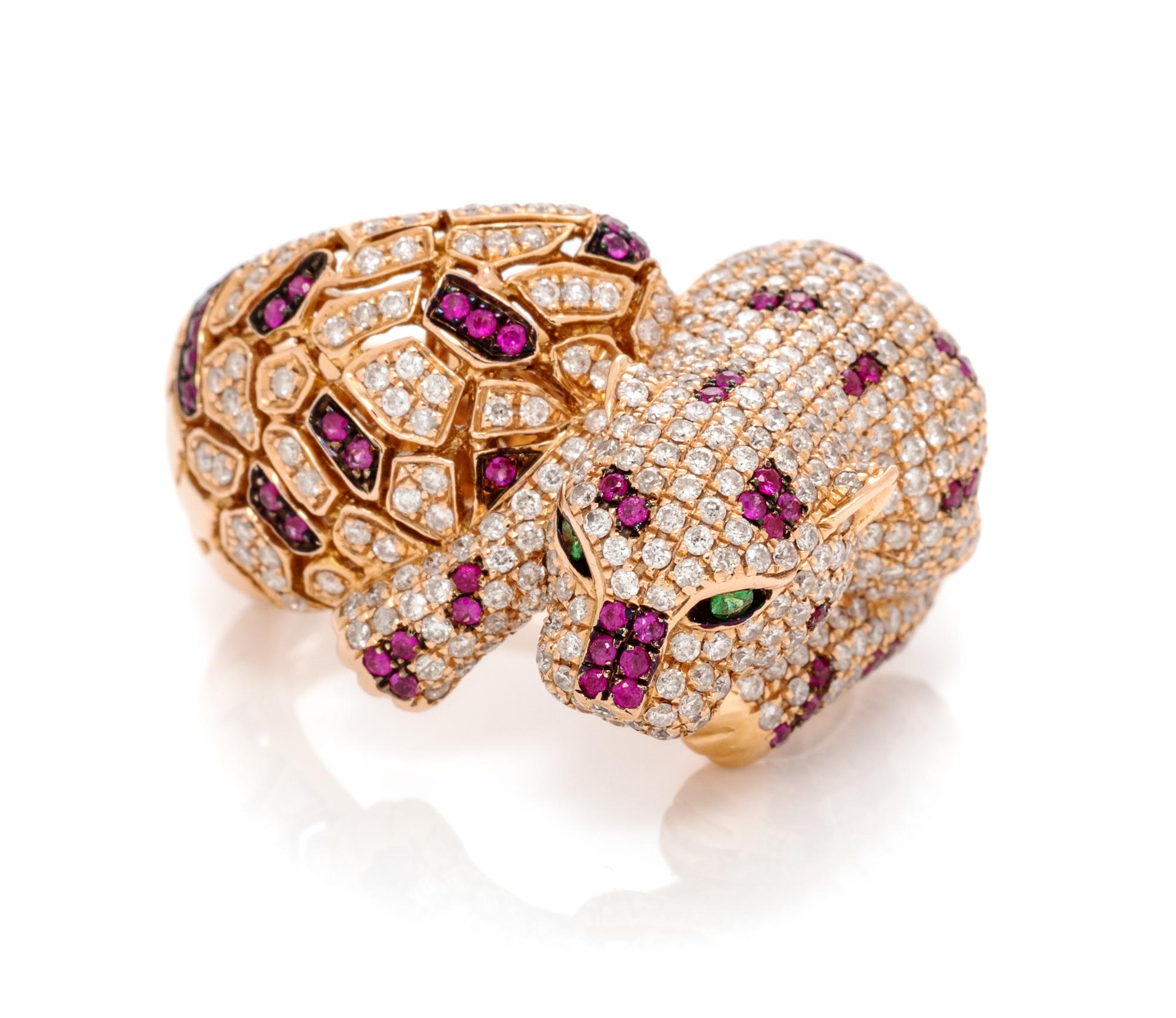 An 18 Karat Rose Gold, Diamond, Ruby and Tsavorite Garnet Panther Motif Ring, 8.75 dwts.
