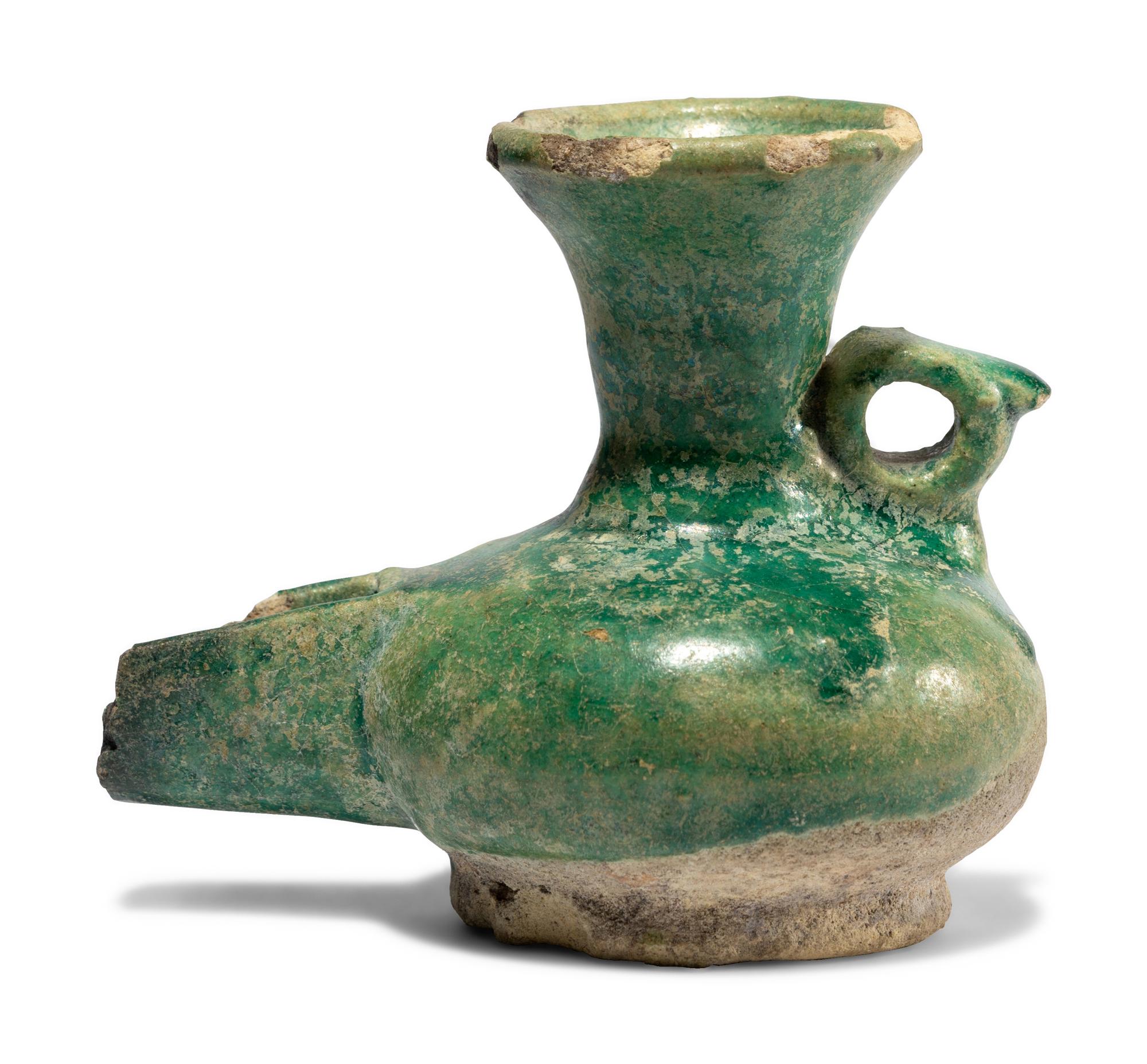 A Persian Green Glazed Vessel