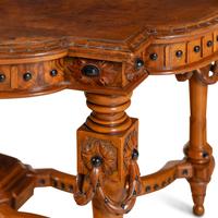 An English Walnut and Part Ebonized Center Table