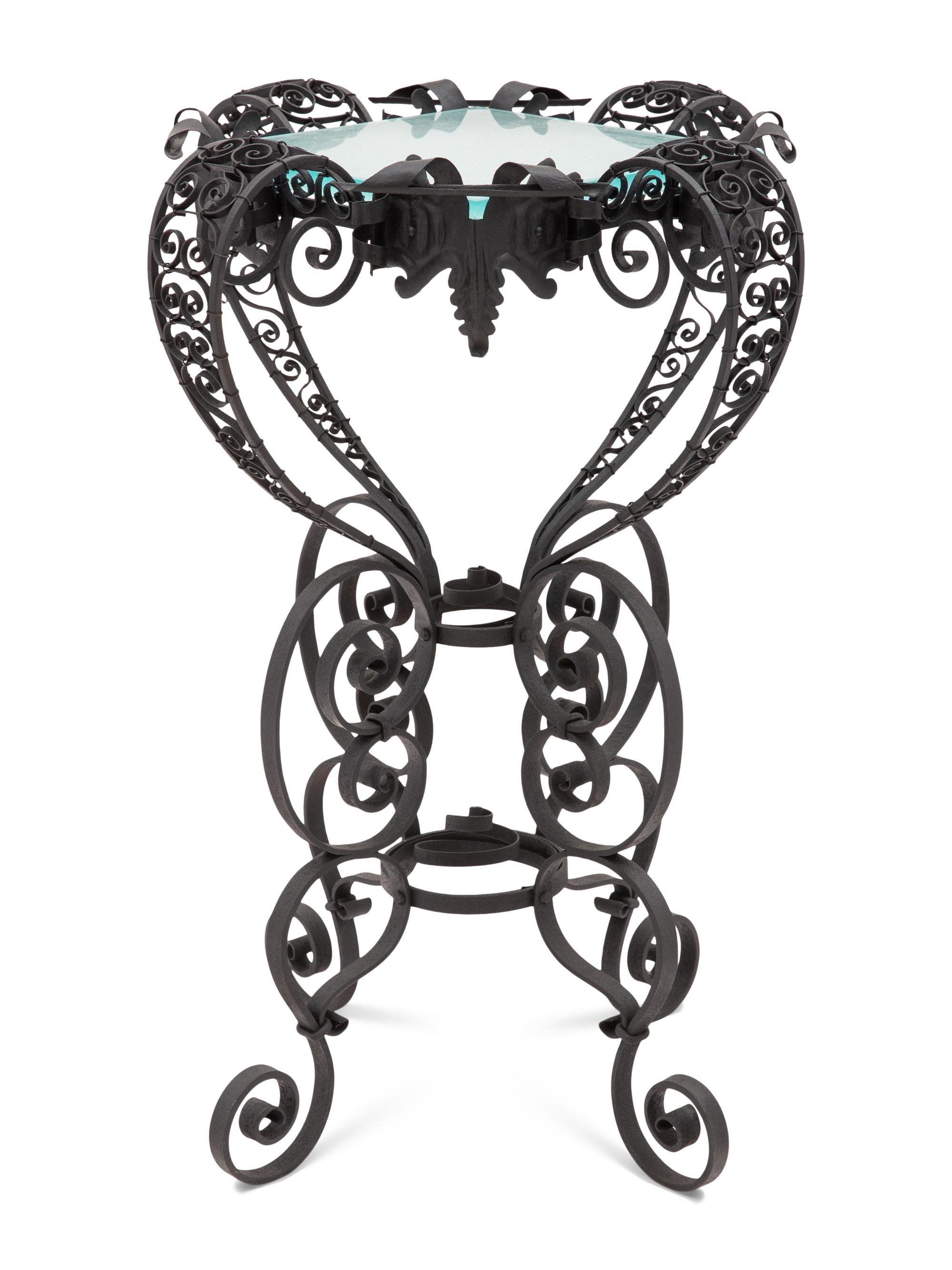 A Spanish Colonial Style Wrought Iron and Glass Stand