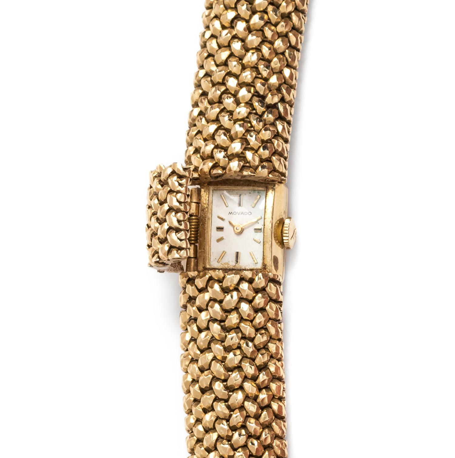MOVADO, YELLOW GOLD SURPRISE WRISTWATCH