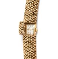 MOVADO, YELLOW GOLD SURPRISE WRISTWATCH