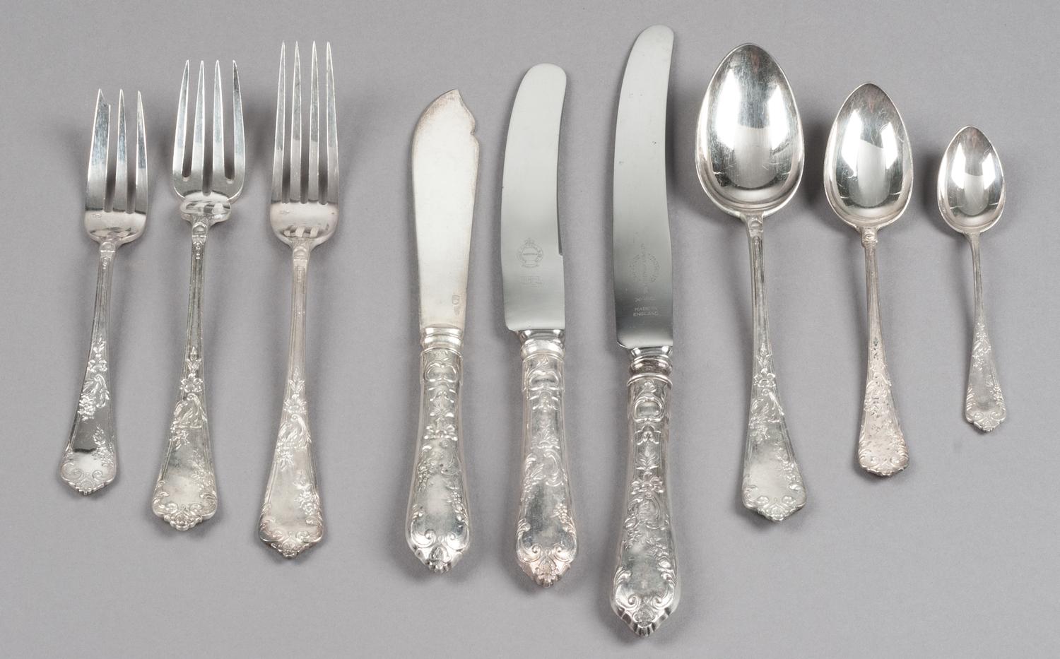 A Russian Silver Flatware Service, Maker's Mark Cyrillic SB, Late 19th/Early 20th Century, comprising: 24 dinner knives 24 luncheon kni