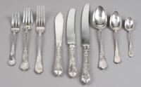 A Russian Silver Flatware Service, Maker's Mark Cyrillic SB, Late 19th/Early 20th Century, comprising: 24 dinner knives 24 luncheon kni