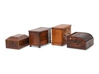 An English Yew Wood Tea Caddy, Two Diminutive Chests of Drawers and a Writing Box