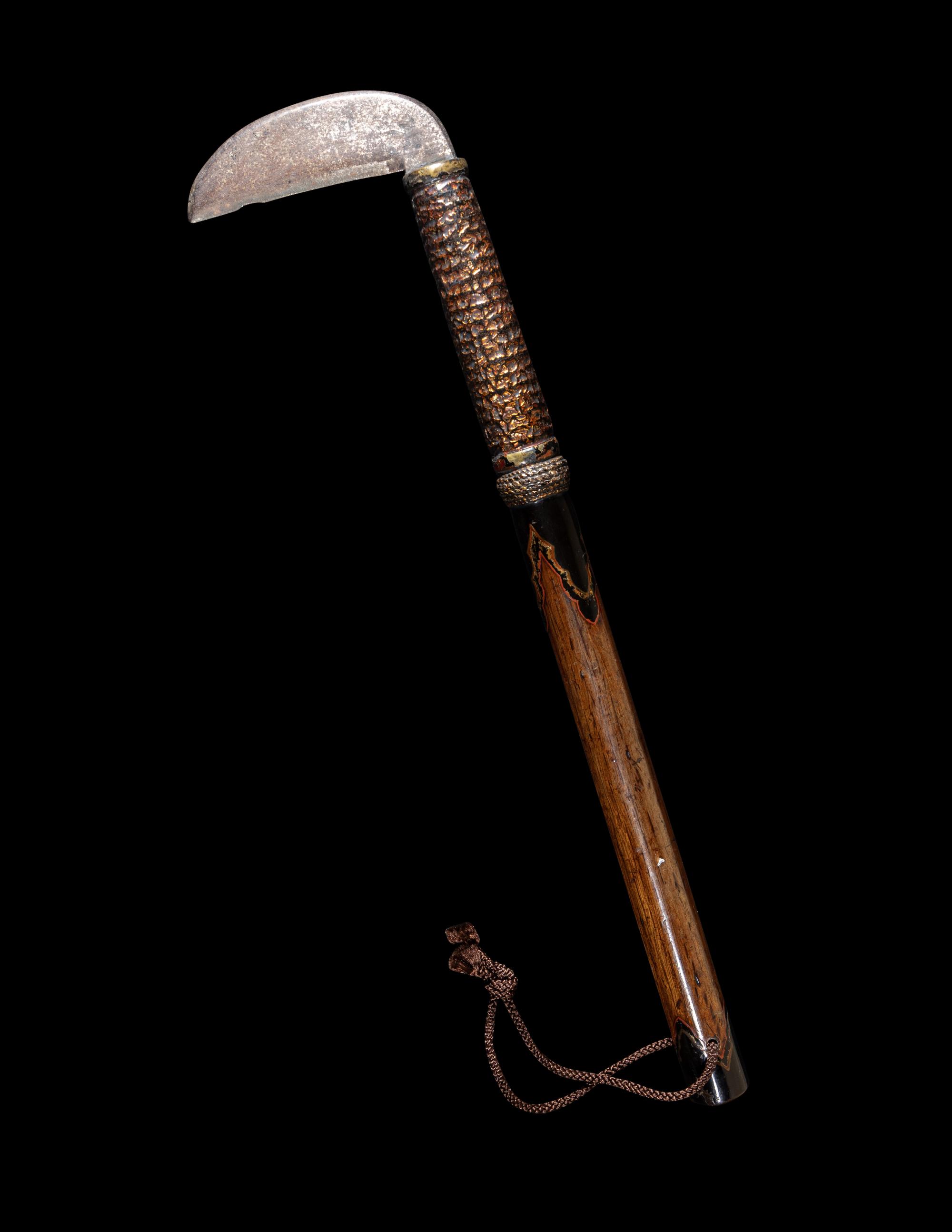 A Japanese Iron and Lacquered Wood Sickle