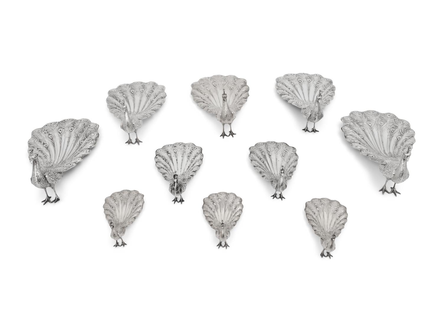 A Collection of Ten American Silver Peacock Table Ornaments