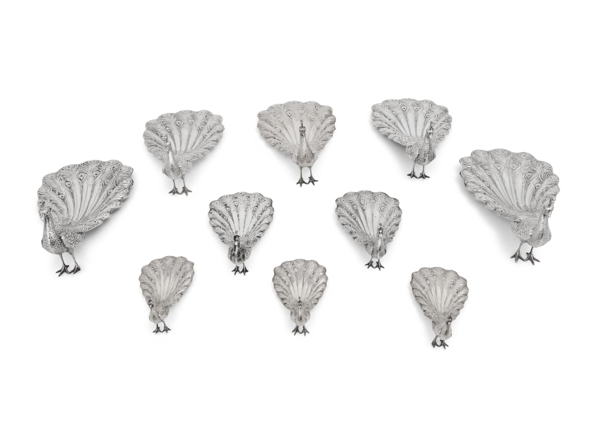 A Collection of Ten American Silver Peacock Table Ornaments