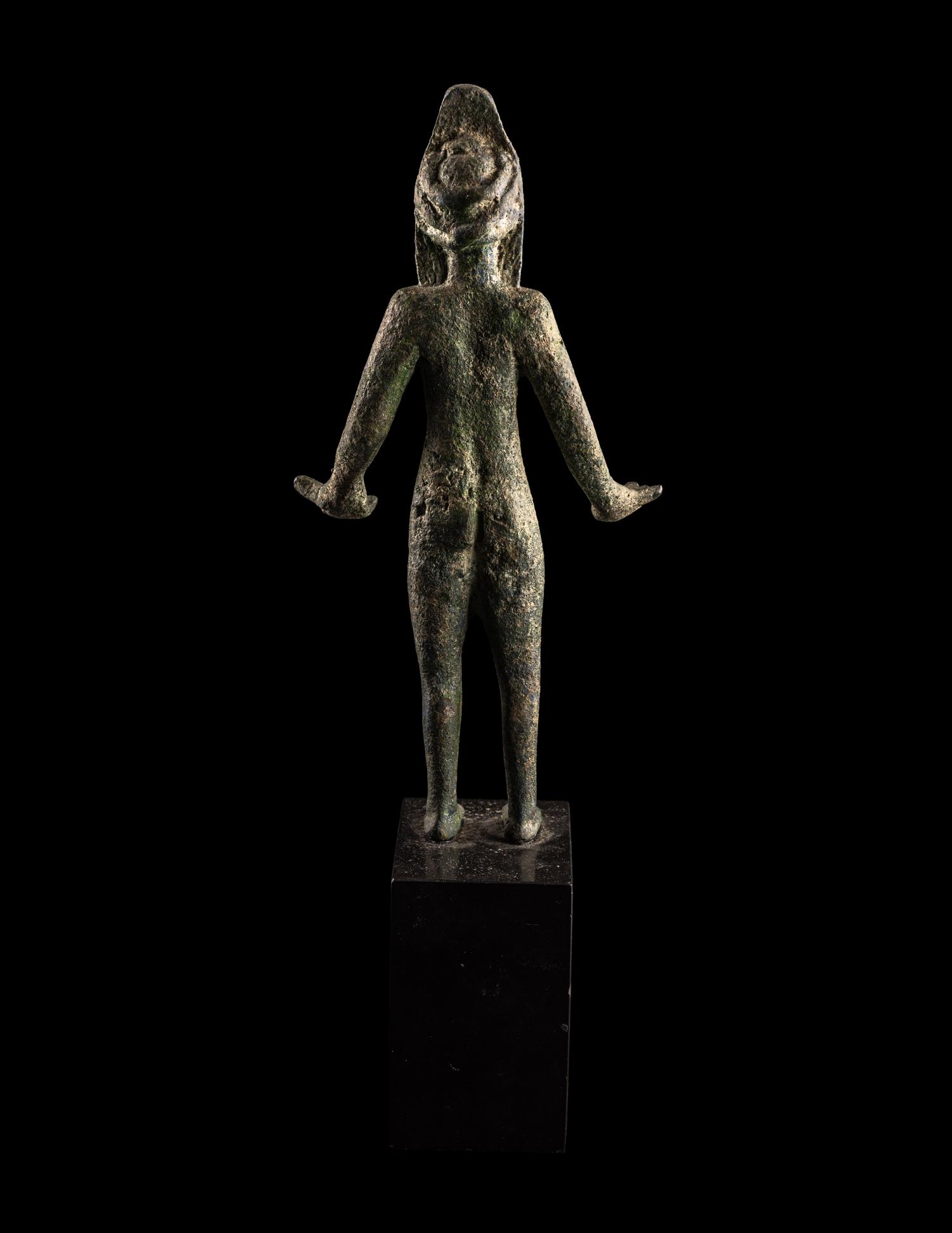 An Etruscan Bronze Female Figure Wearing a Theater Mask