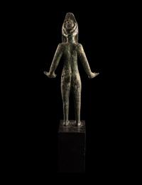 An Etruscan Bronze Female Figure Wearing a Theater Mask