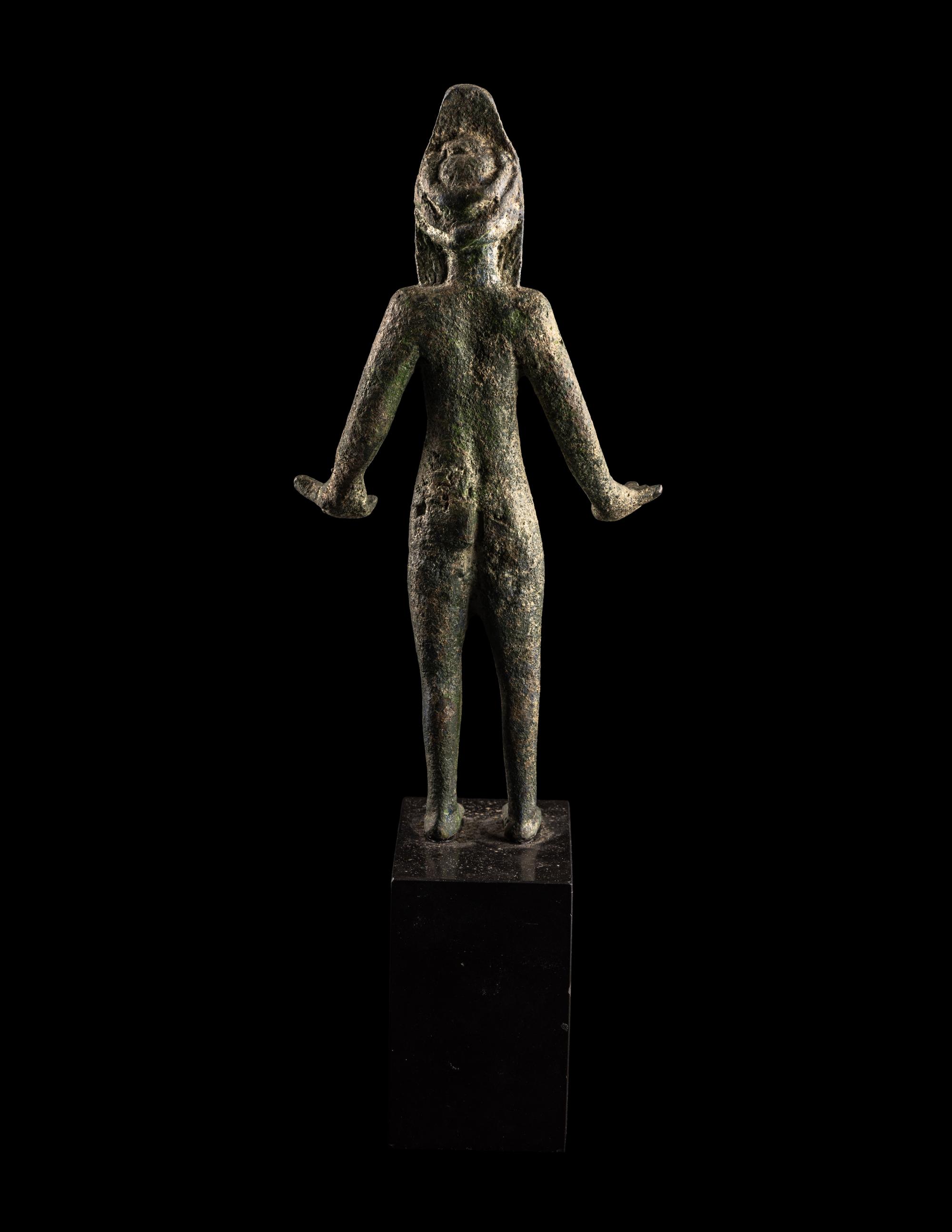 An Etruscan Bronze Female Figure Wearing a Theater Mask