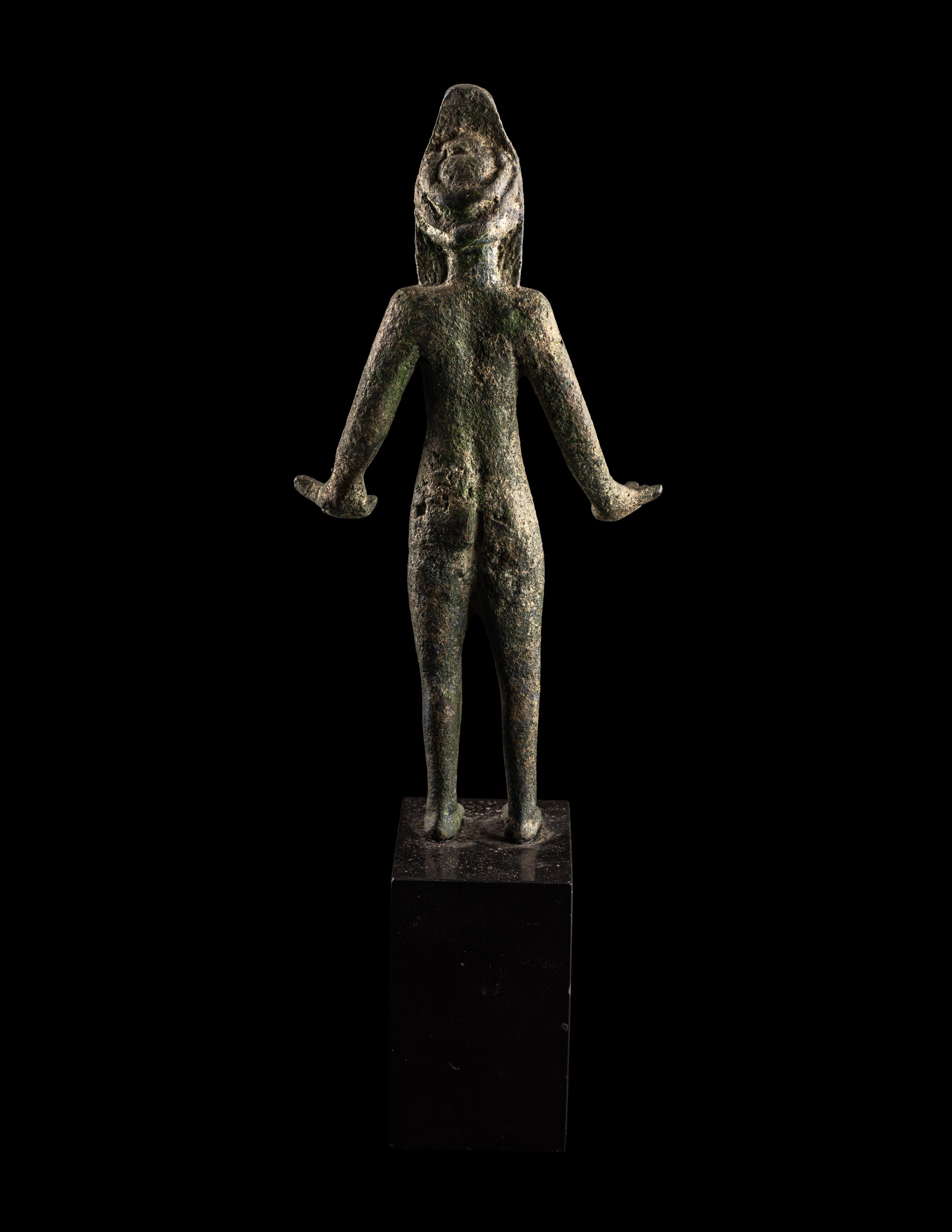 An Etruscan Bronze Female Figure Wearing a Theater Mask