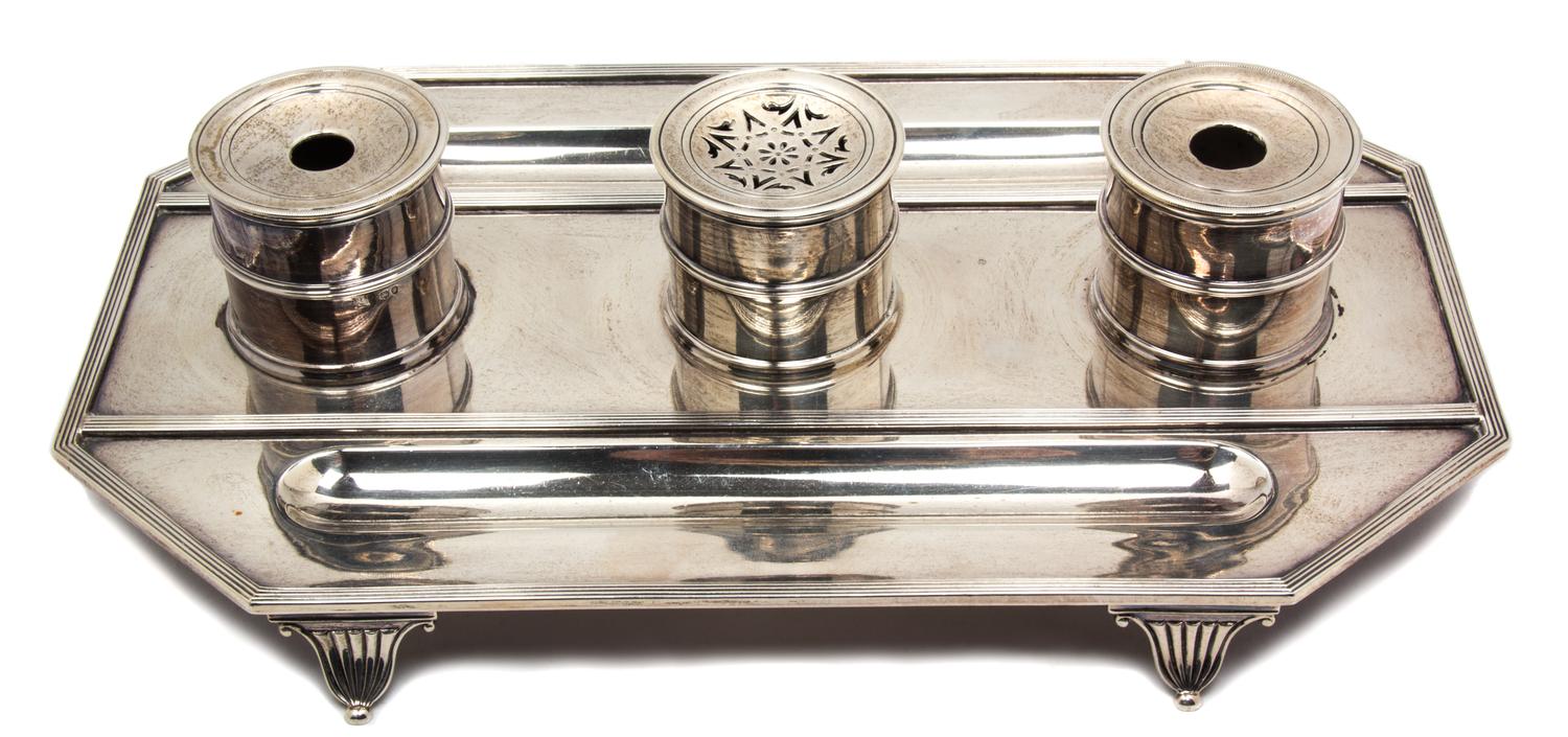 A Victorian Silver Standish, John Aldwinckle & Thomas Slater, London, 1891, of octagonal form with an inkwell, pounce pot, quill holder