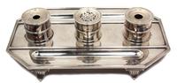 A Victorian Silver Standish, John Aldwinckle & Thomas Slater, London, 1891, of octagonal form with an inkwell, pounce pot, quill holder