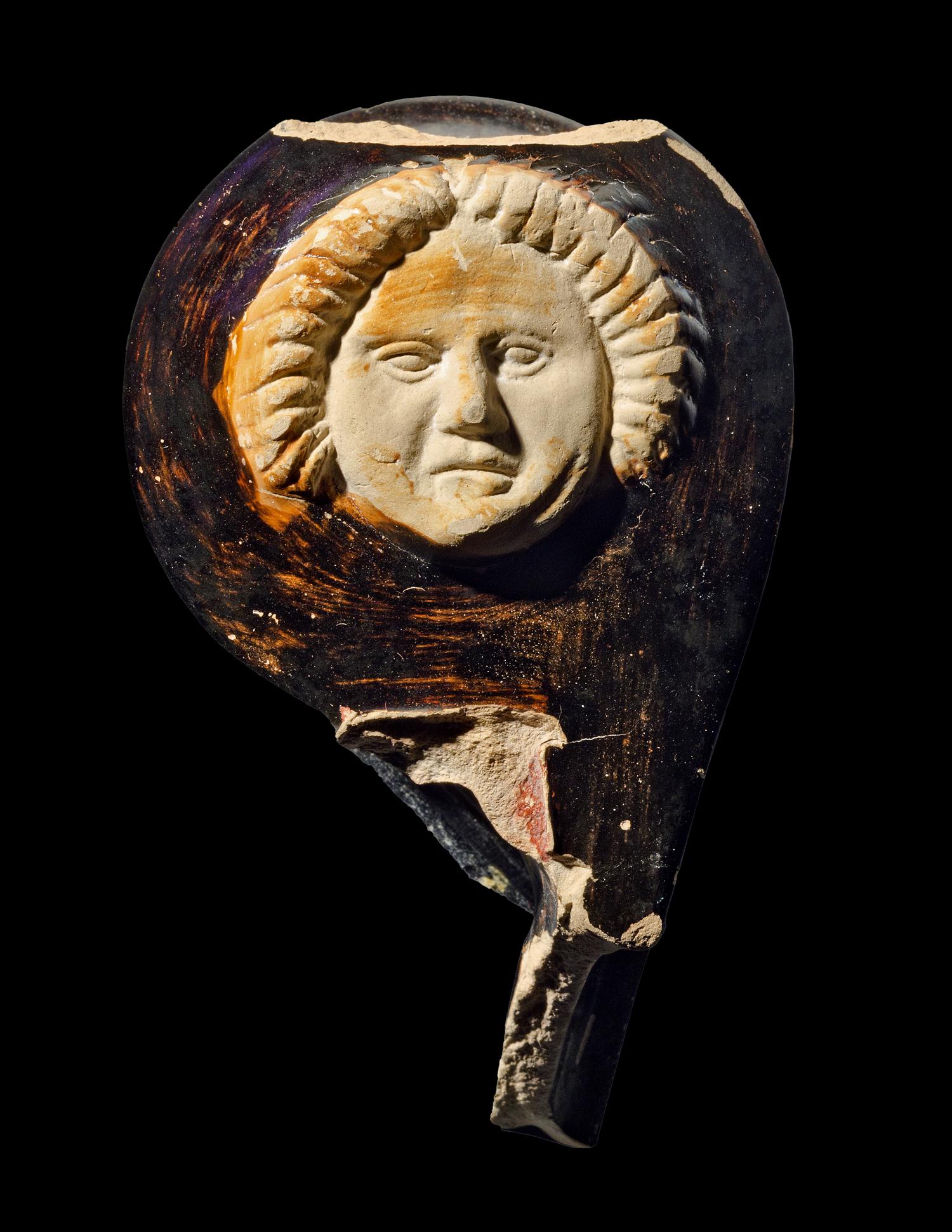 An Apulian Red-Figured Volute-Krater Handle Fragment