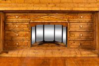 A Biedermeier Figured Walnut Secretary Bookcase