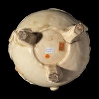 A Chinese White Glazed Tripod Incense Burner, Yuan to Ming Dynasty 元-明 白釉雙龍趕珠紋鬲式爐
