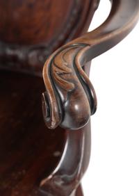 A Baroque Revival Carved Mahogany Armchair
