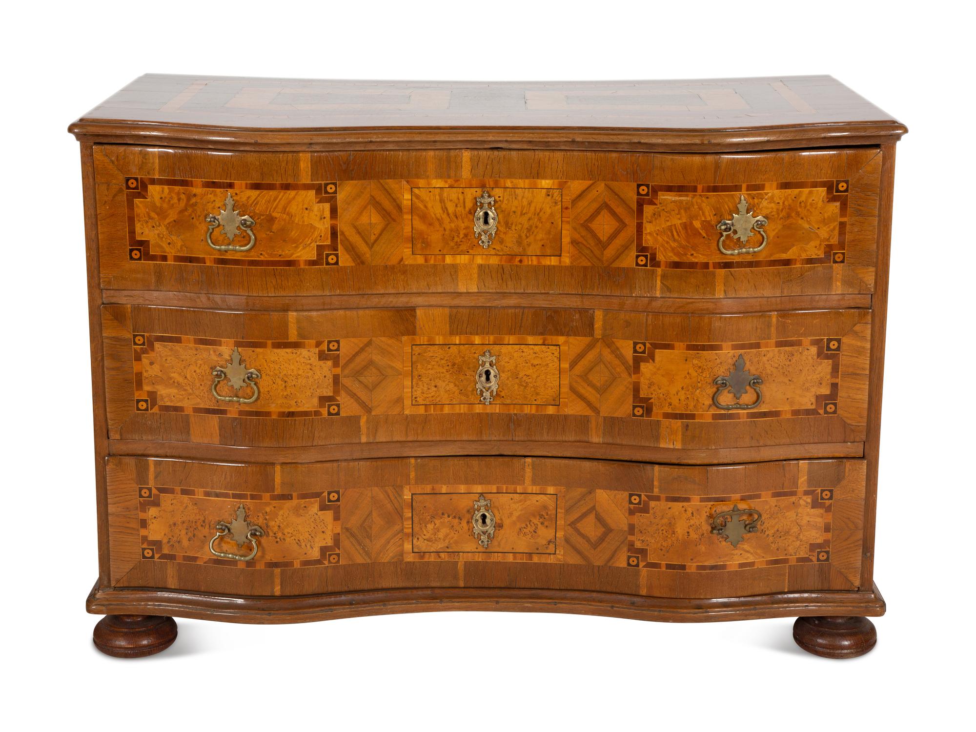 An Austrian Walnut Marquetry Commode
