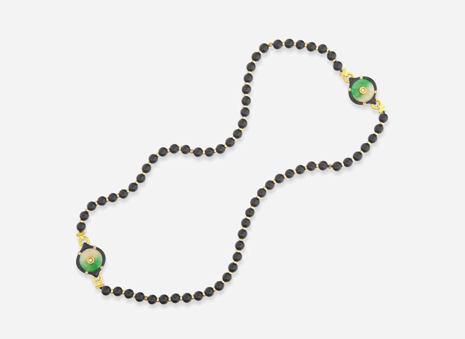 An 18K Yellow Gold and Black Onyx Bead Necklace
