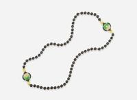 An 18K Yellow Gold and Black Onyx Bead Necklace