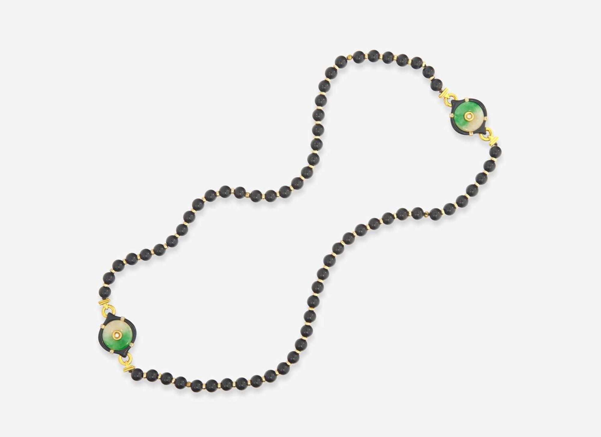 An 18K Yellow Gold and Black Onyx Bead Necklace