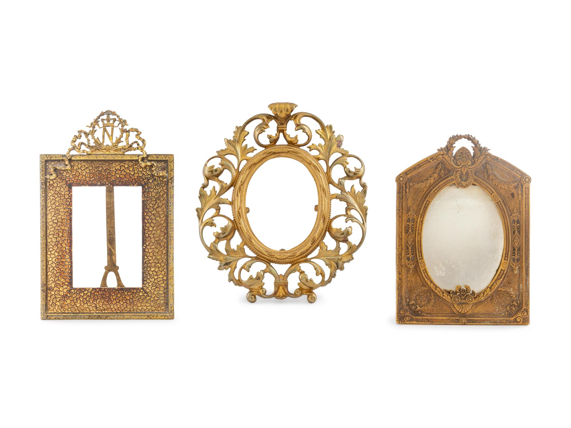 Three Bronze or Brass Frames