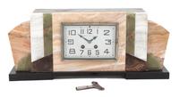 An Art Deco Marble Mantel Clock Length 18 inches. — MME. G. PATIGNY, COUTANCES, FRANCE, CIRCA 1925