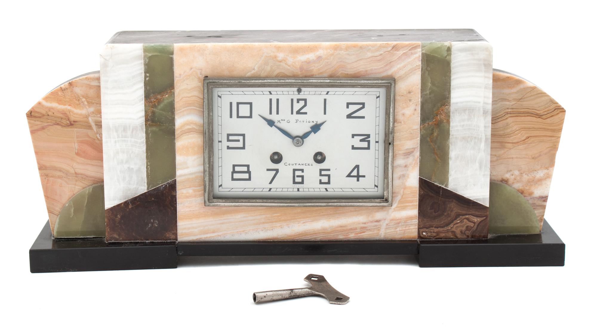 An Art Deco Marble Mantel Clock Length 18 inches. — MME. G. PATIGNY, COUTANCES, FRANCE, CIRCA 1925