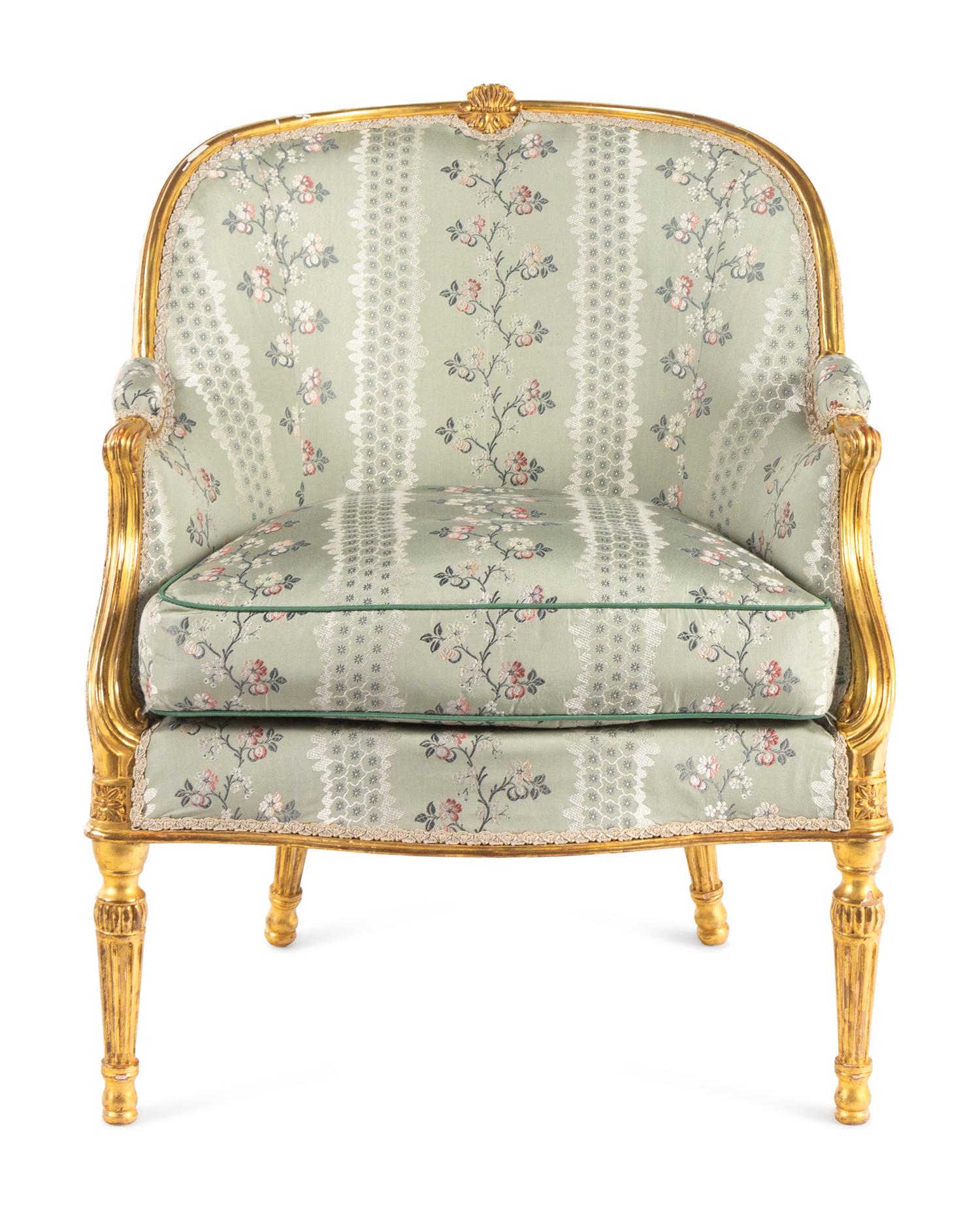 A George III Carved Giltwood Bergère