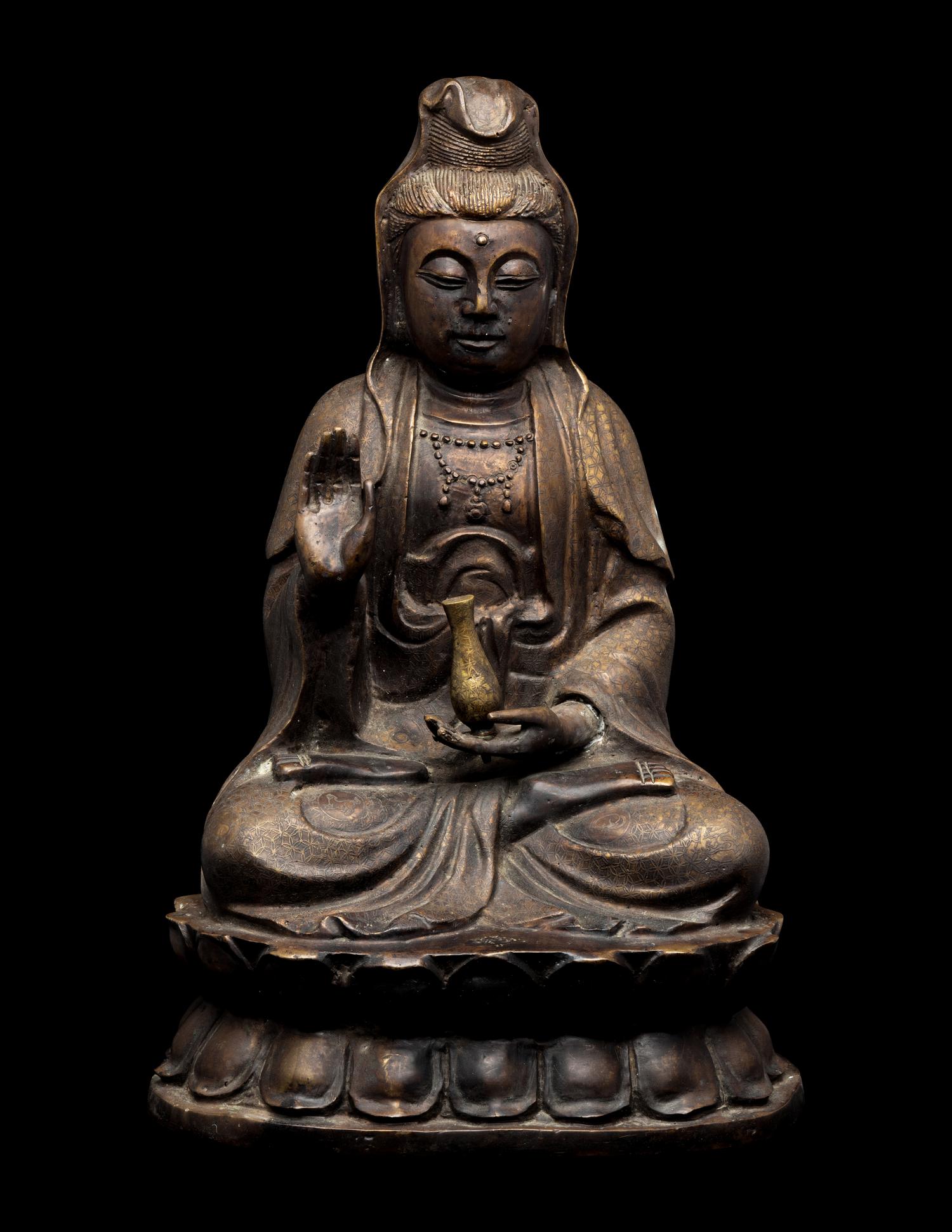 A Chinese Bronze Figure of Guanyin 銅觀音