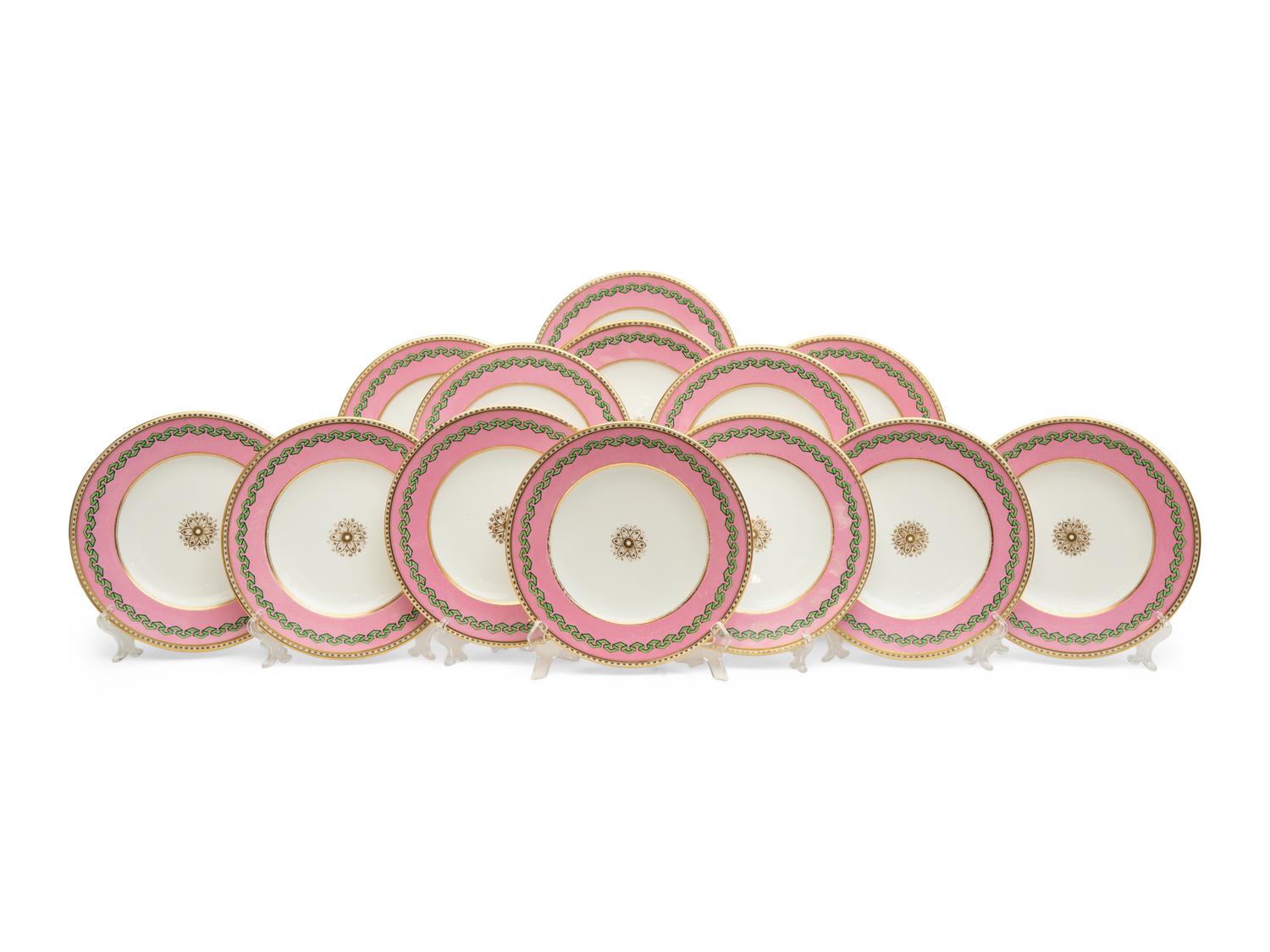 A Set of Thirteen Pink and Green Painted Porcelain Luncheon Plates