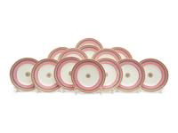 A Set of Thirteen Pink and Green Painted Porcelain Luncheon Plates
