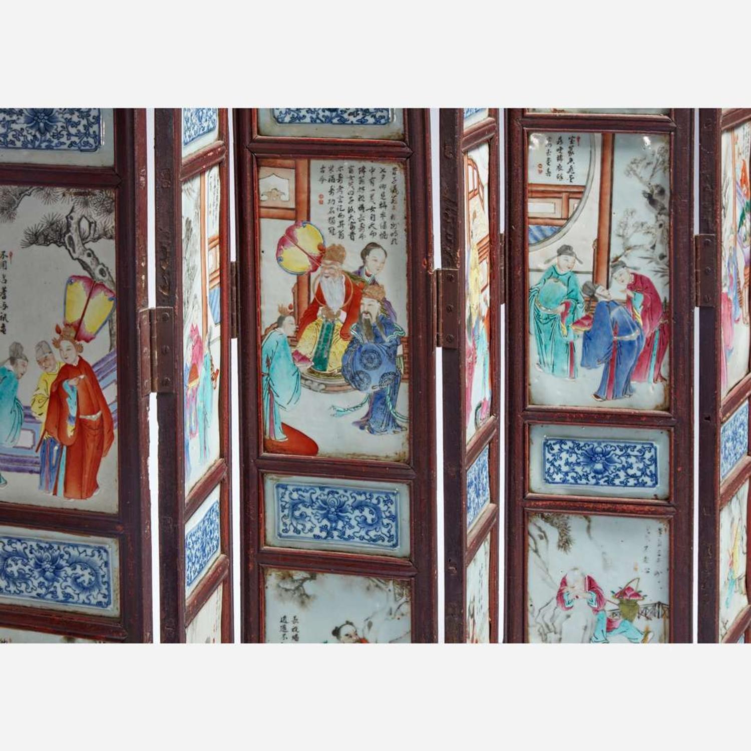 A Chinese famille rose-porcelain mounted eight-panel screen