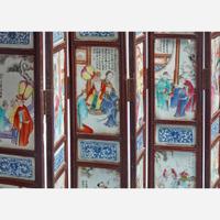 A Chinese famille rose-porcelain mounted eight-panel screen