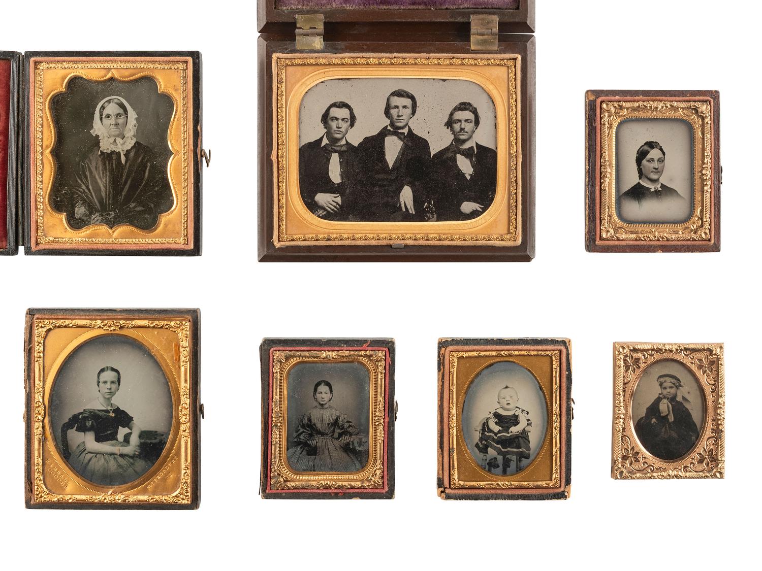 [EARLY PHOTOGRAPHY]. A group of 51 assorted ambrotype and tintype portraits of men, women, and children.
