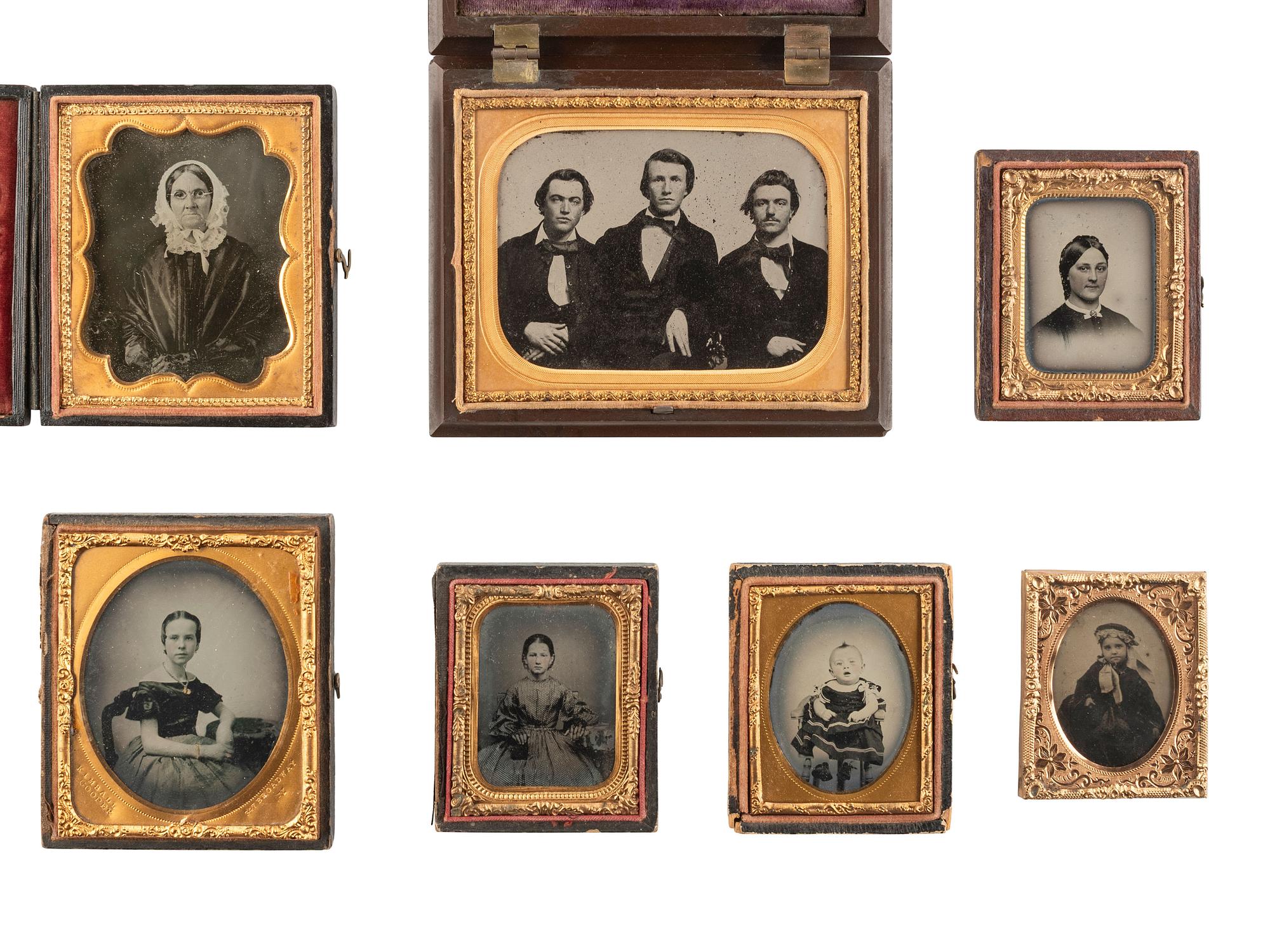 [EARLY PHOTOGRAPHY]. A group of 51 assorted ambrotype and tintype portraits of men, women, and children.