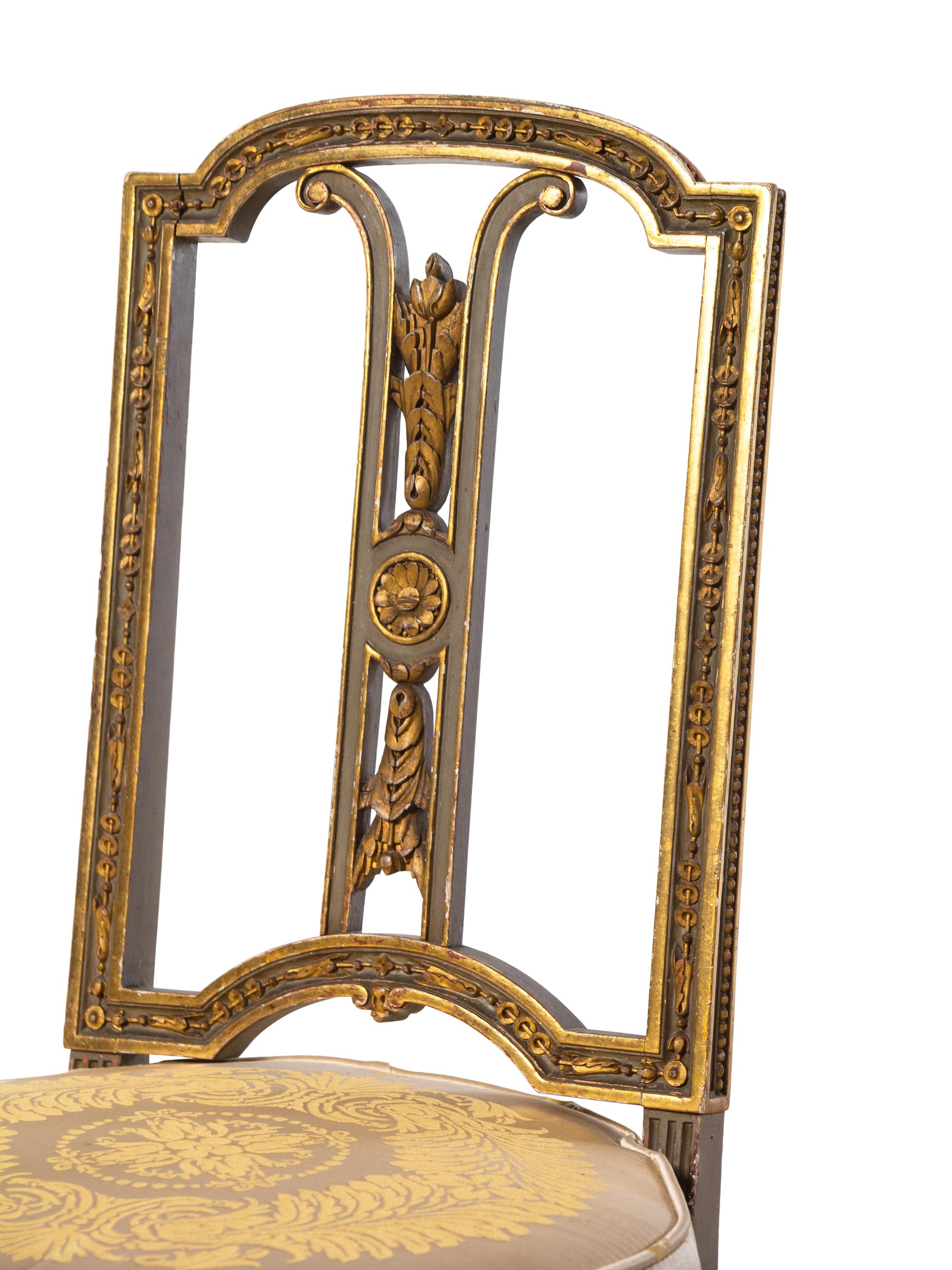 A Pair of Louis XVI Style Painted and Parcel Gilt Side Chairs