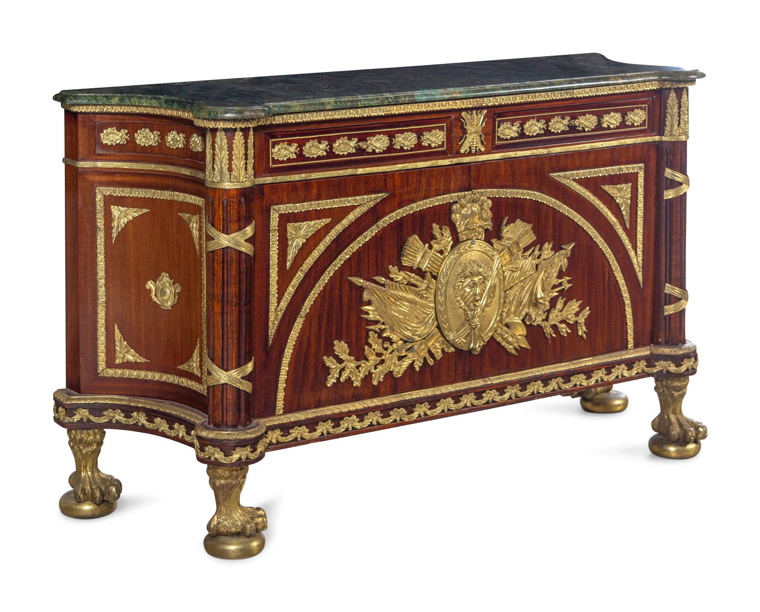 A Louis XVI Style Gilt Metal Mounted Mahogany Commode à Vantaux After the Model by Guillaume Benneman
