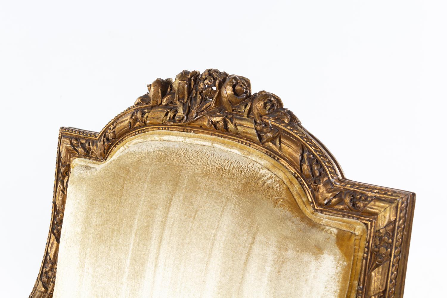 A Pair of Louis XVI Carved Giltwood Fauteuils