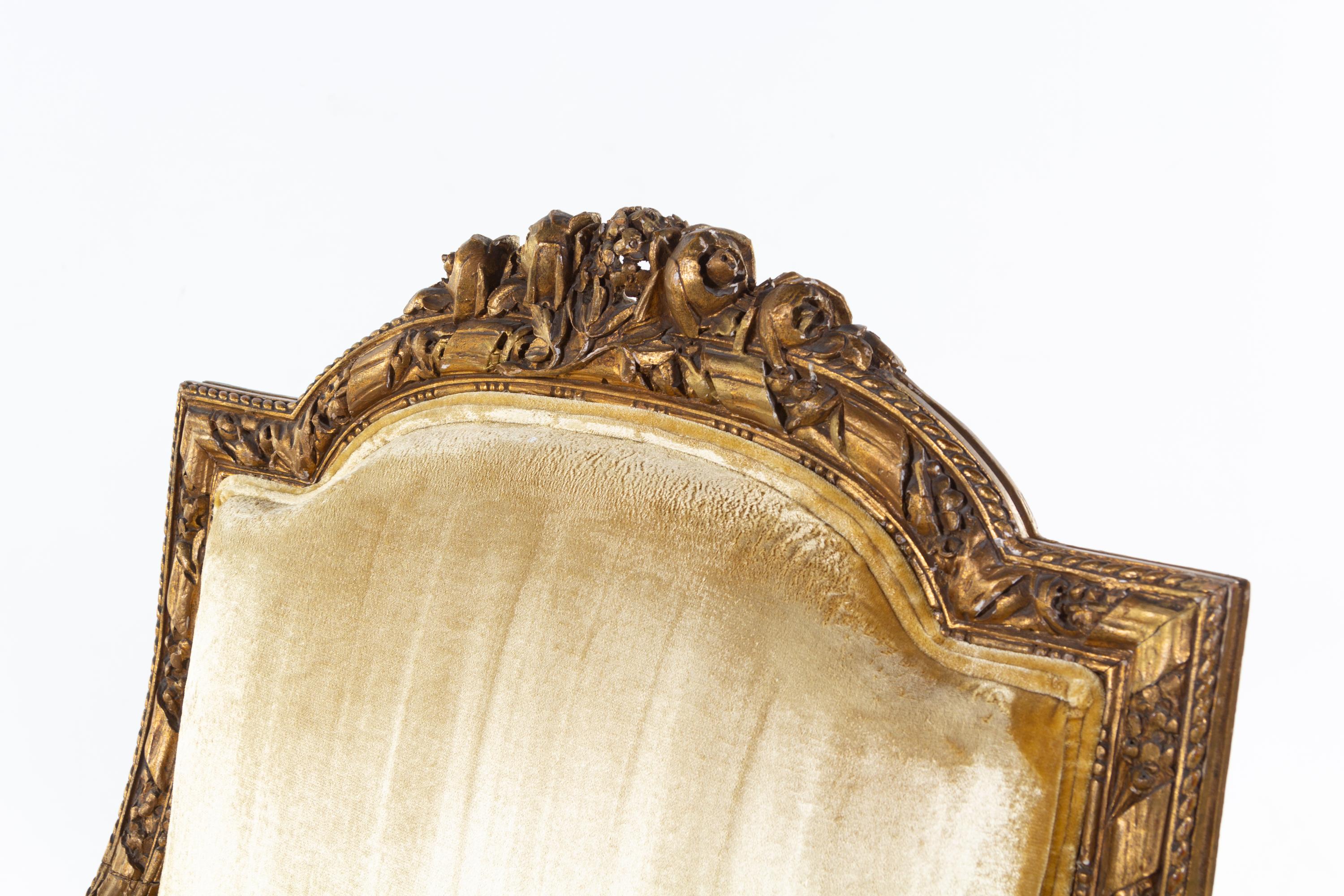 A Pair of Louis XVI Carved Giltwood Fauteuils