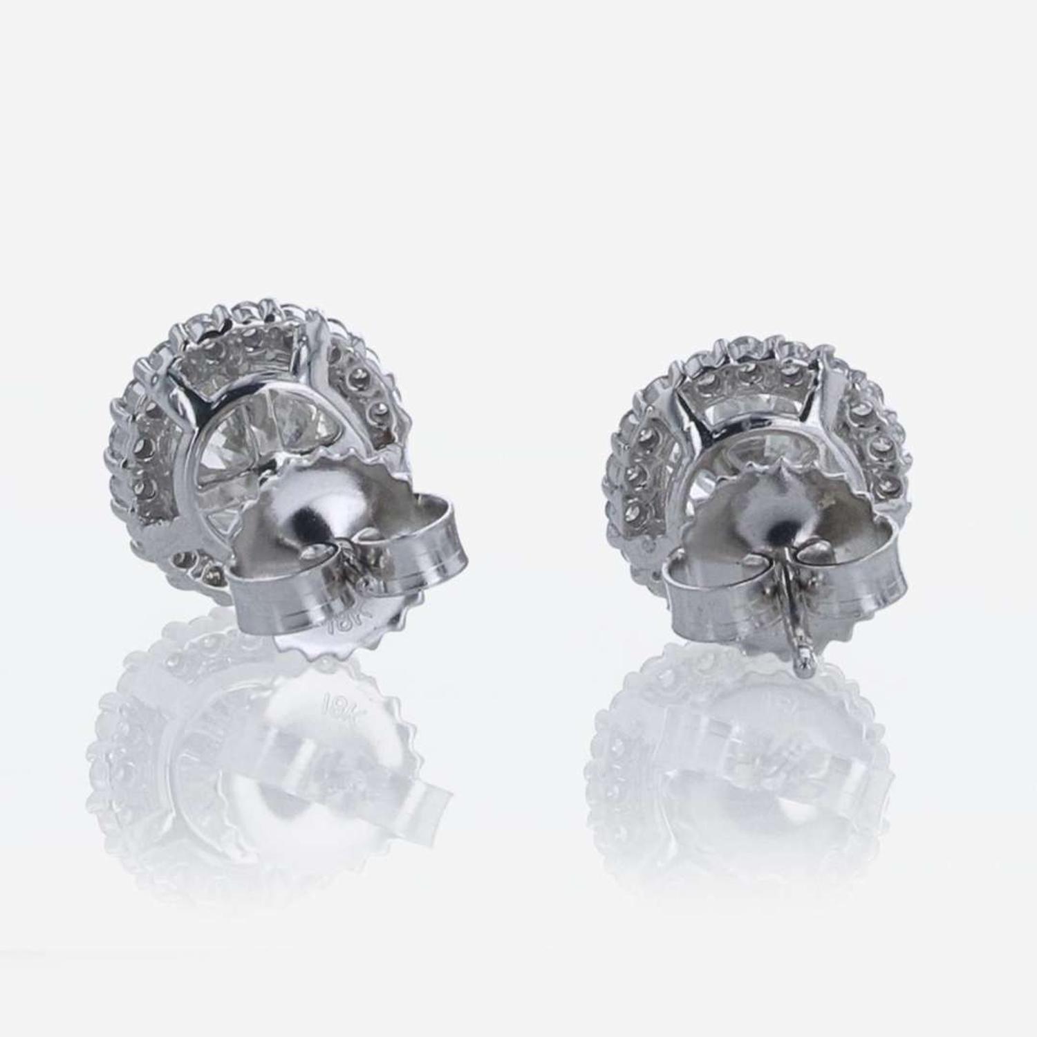 A Pair of 18K White Gold Halo Diamond Stud Earrings