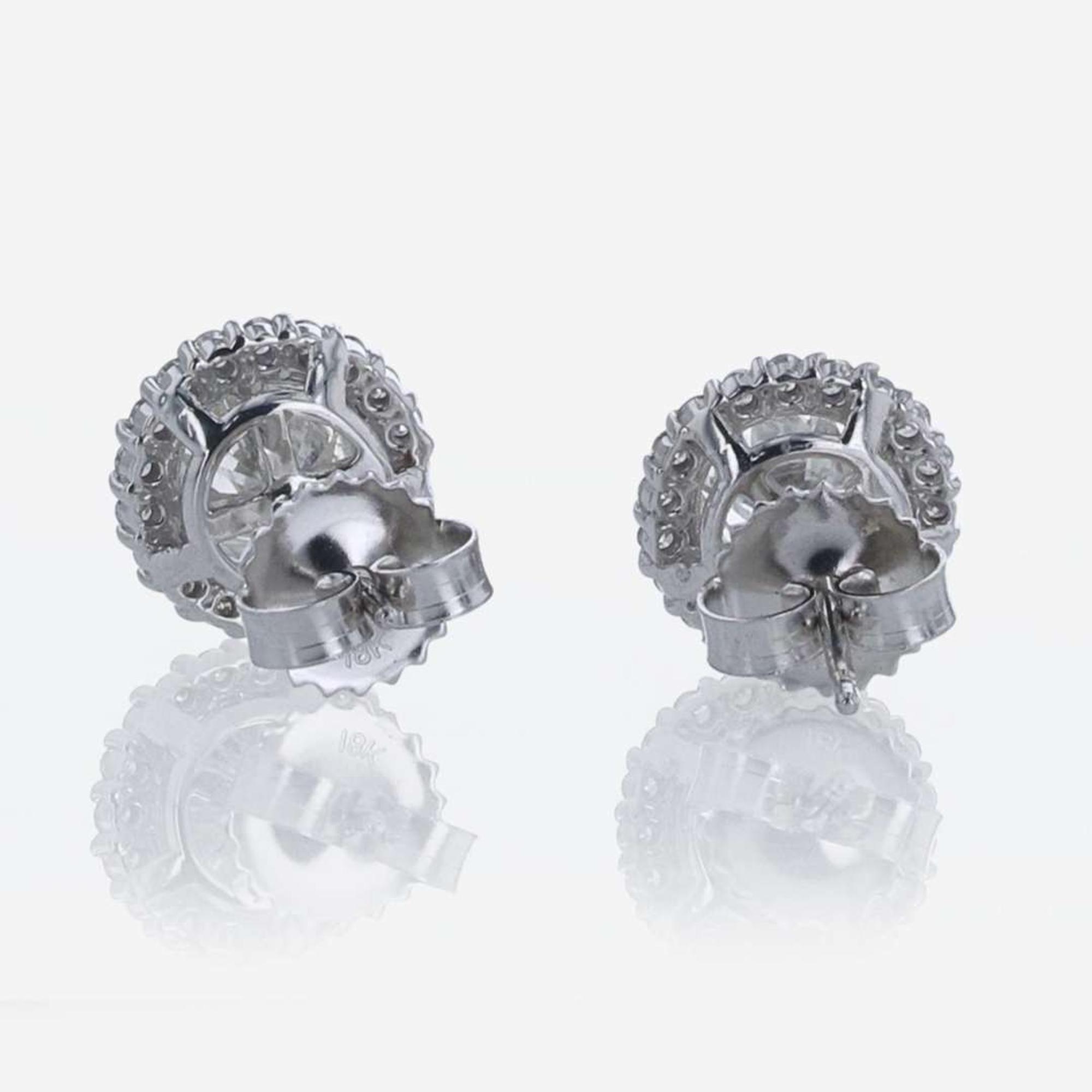 A Pair of 18K White Gold Halo Diamond Stud Earrings