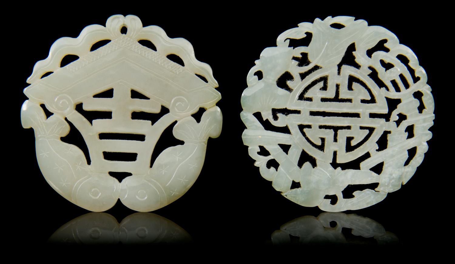 Two Carved Jade Pendants Diameter 2 1/8 inches.