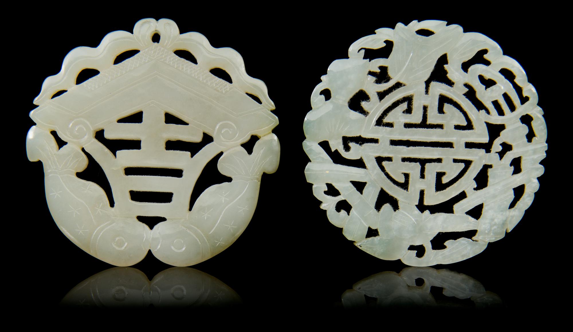 Two Carved Jade Pendants Diameter 2 1/8 inches.