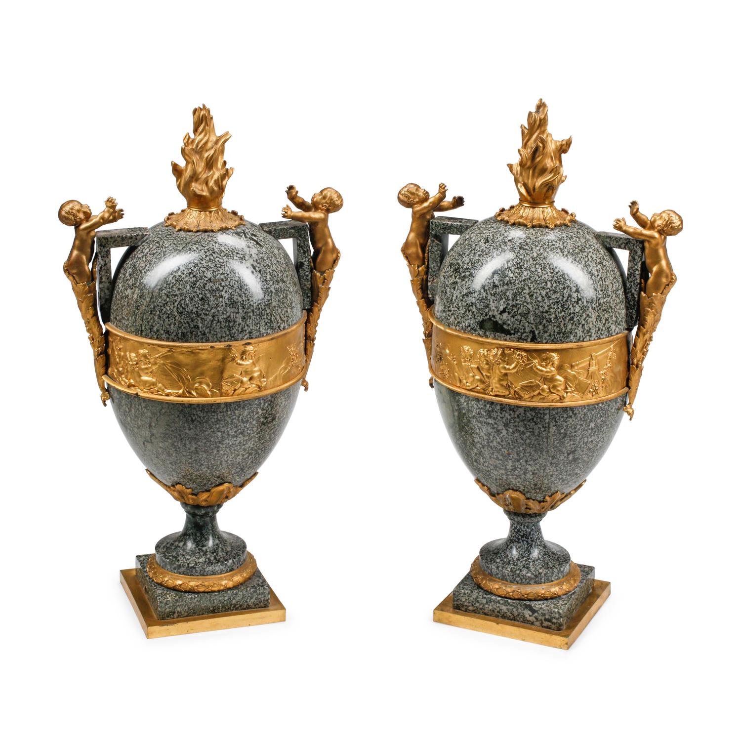 A Pair of Large French Gilt Bronze Mounted Marble Urns