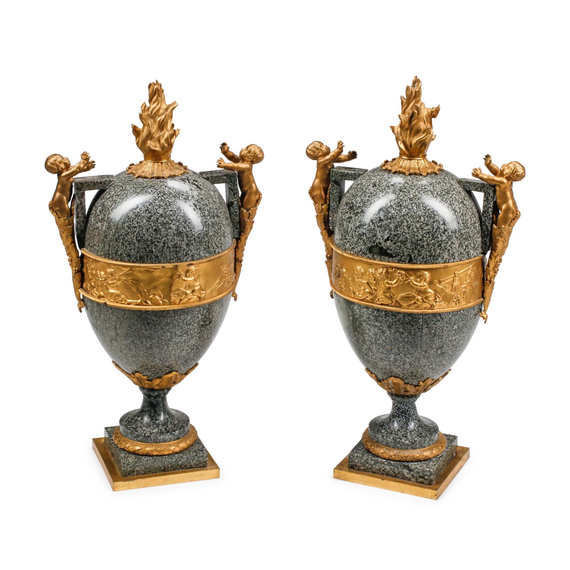 A Pair of Large French Gilt Bronze Mounted Marble Urns
