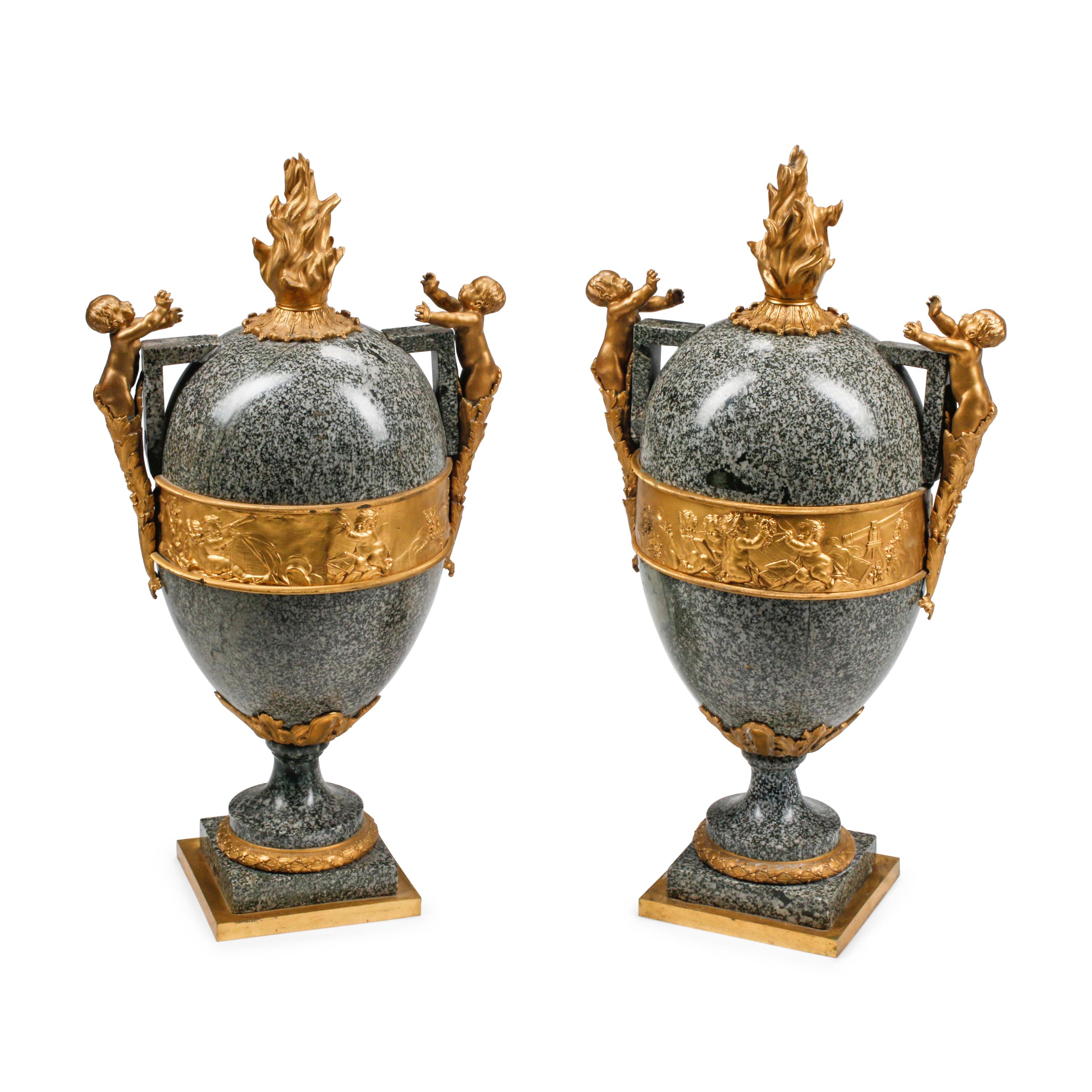 A Pair of Large French Gilt Bronze Mounted Marble Urns