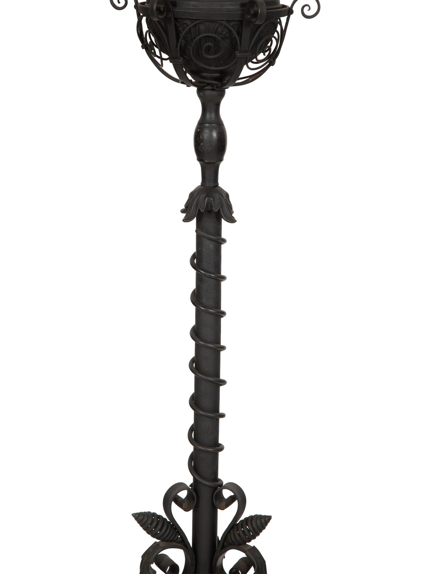 A Painted Wrought Iron Torchère Mounted as a Floor Lamp