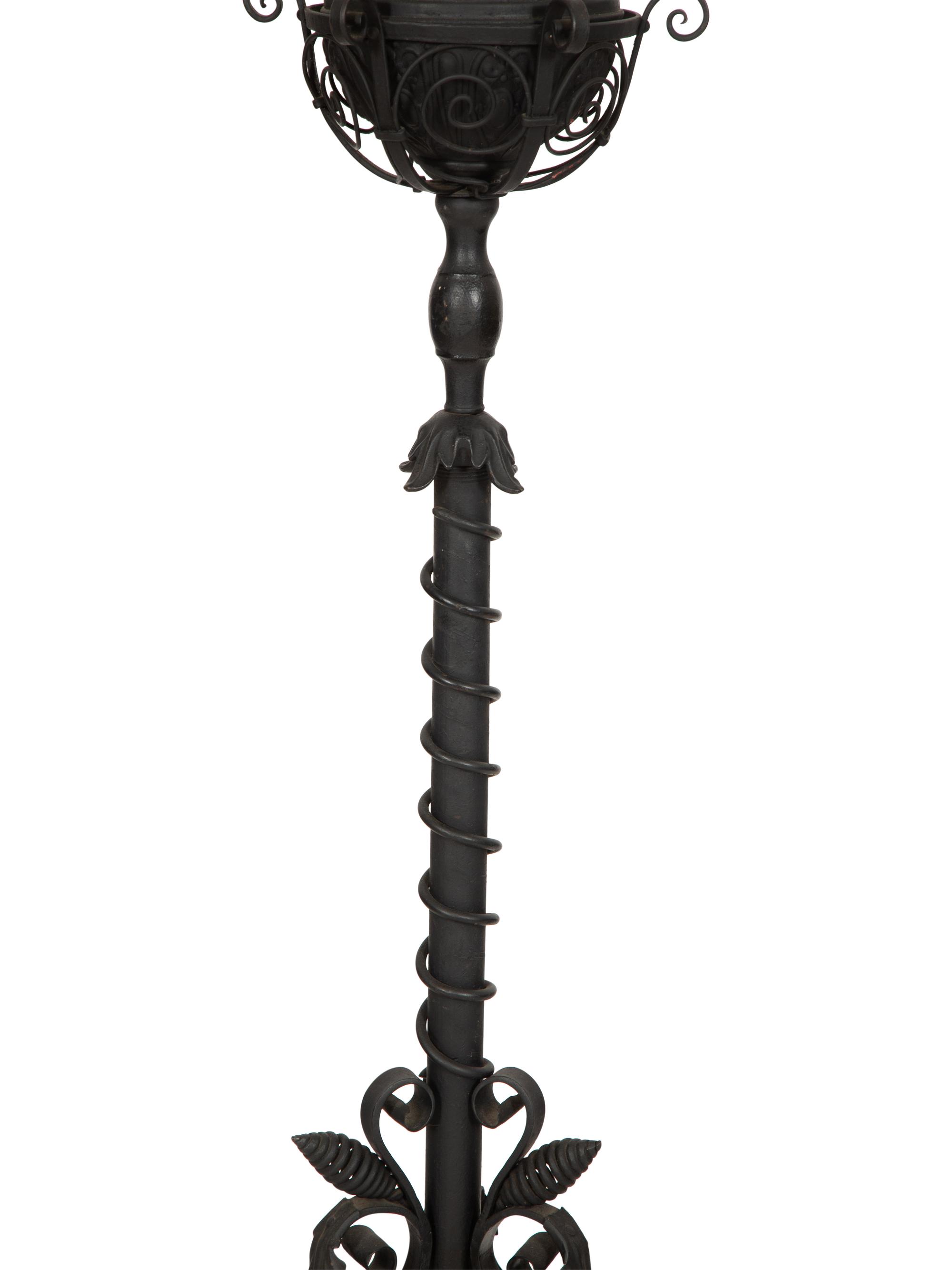A Painted Wrought Iron Torchère Mounted as a Floor Lamp